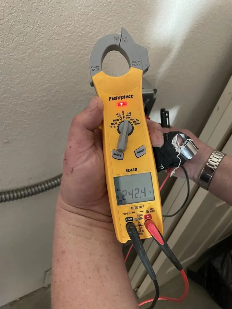 Voltage testing with clamp meter during Aluminum Wiring Replacement in Ontario